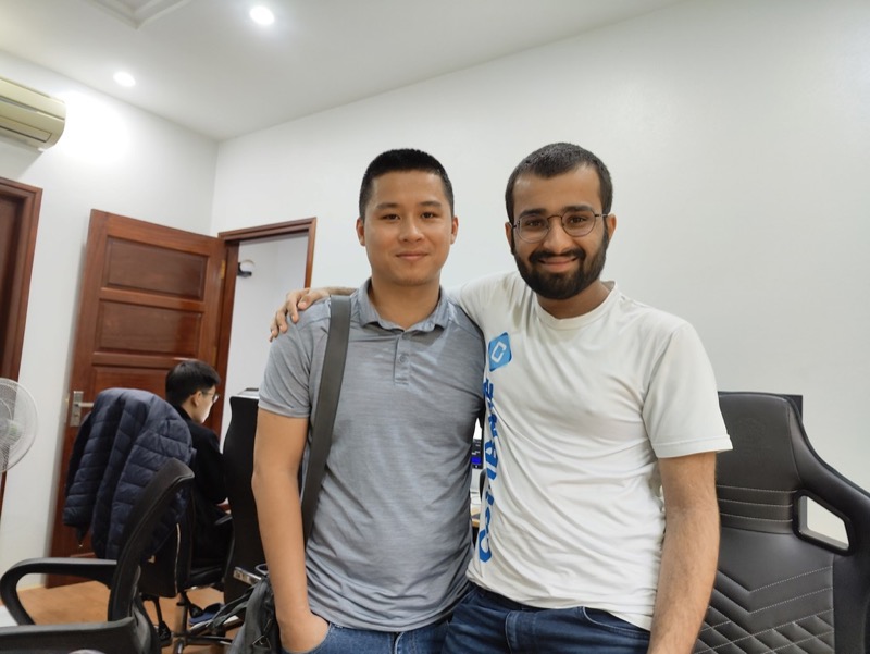 Rasikh Morani with a colleague in an office